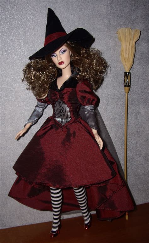 Embrace the enchanting allure of the wicked hex witch doll